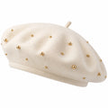 Béret beige avec perles dorées