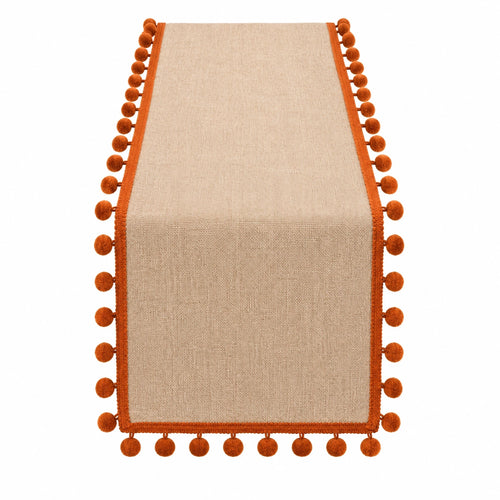 Chemin de table avec pompons beige et orange